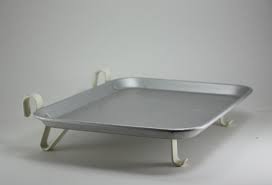 What are the hooks on this tray for?  What is served on this tray?